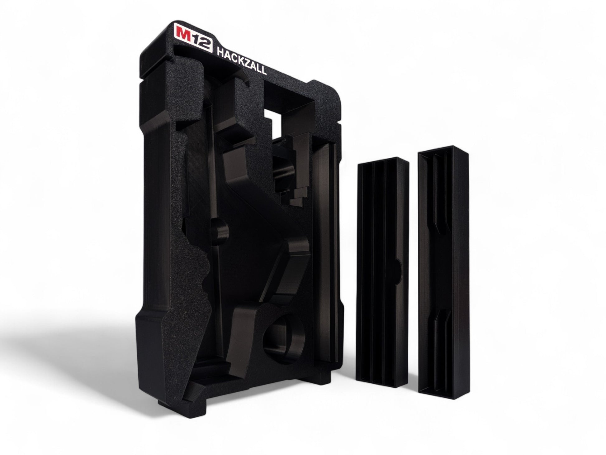 Black M12 Hackzall tool insert standing upright on a white background