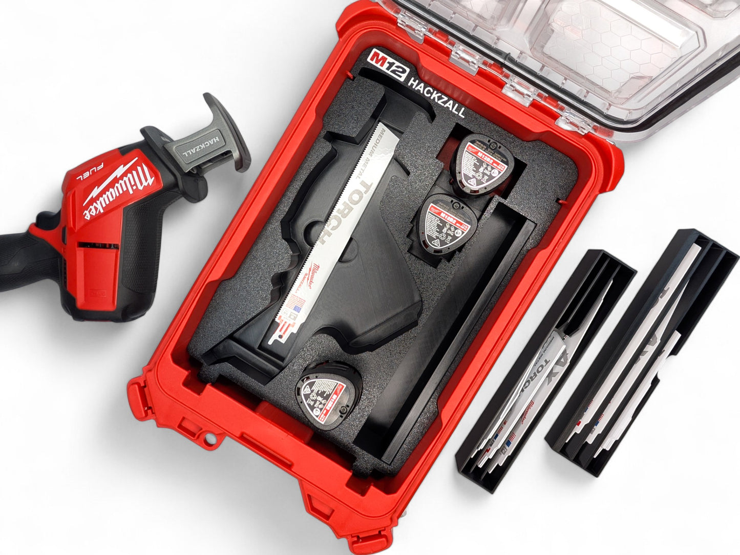Milwaukee tool set with drill and bits on a white background