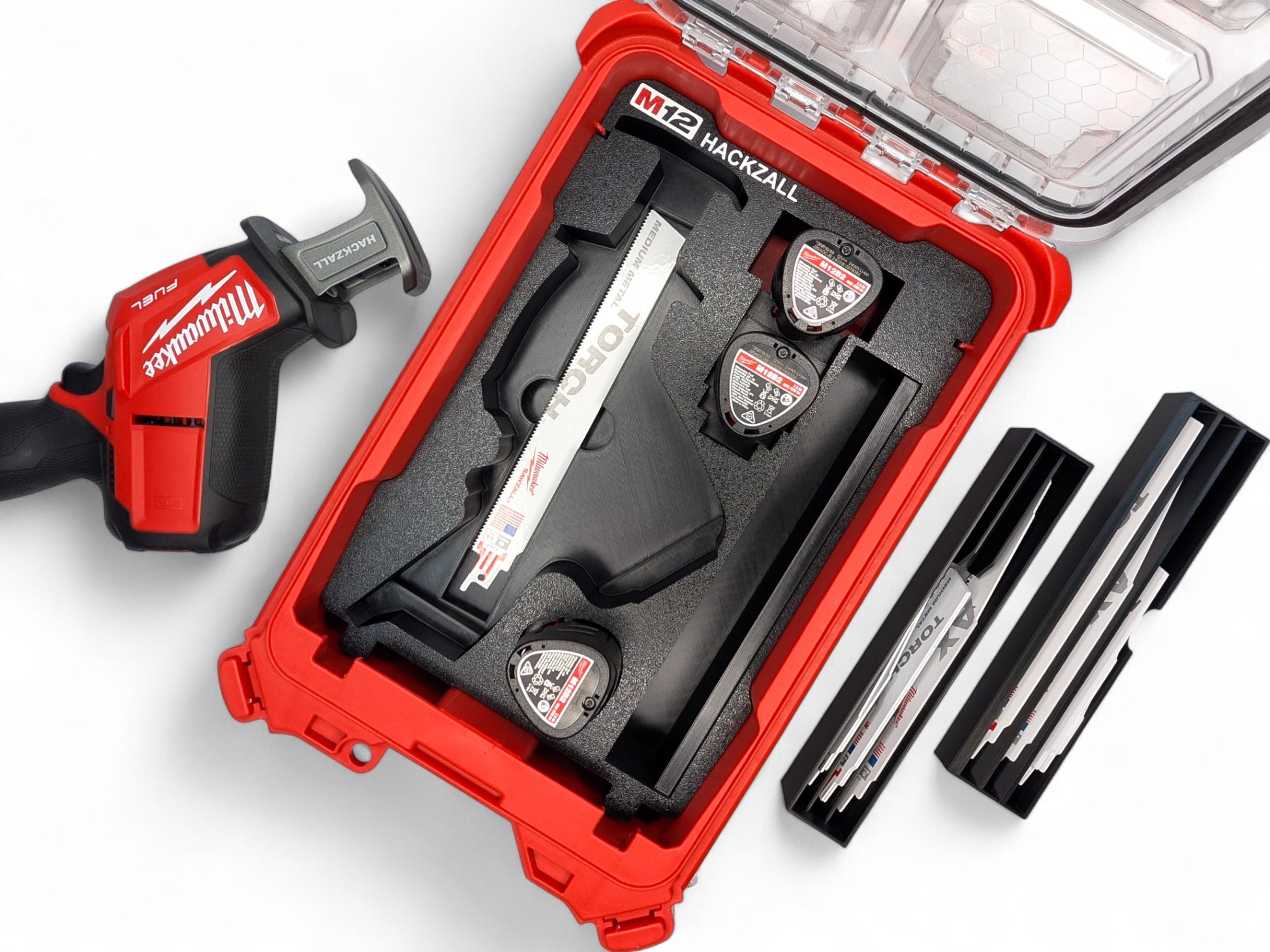 Milwaukee tool set with drill and bits on a white background