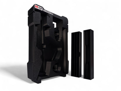 Black M12 Hackzall tool insert standing upright on a white background